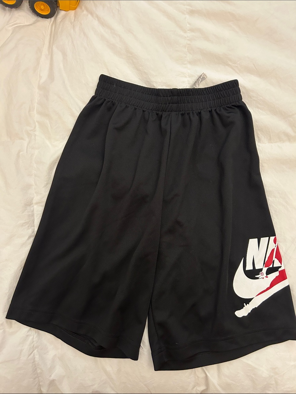 Nike Black Boys Athletic Shorts with White and Red Logo